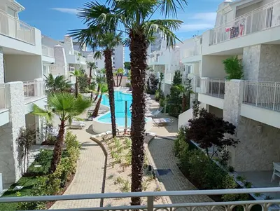 Piscina di Residence Florinas con piscina - Family Apartments Lido di Jesolo o nelle vicinanze