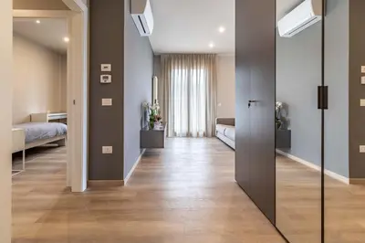 Letto o letti in una camera di IdealHome Suite