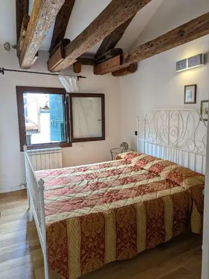 Letto o letti in una camera di Attico Sospiri