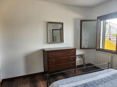 Letto o letti in una camera di Casa Carolina