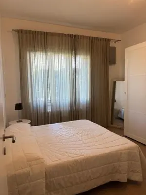 Letto o letti in una camera di Bianca's home