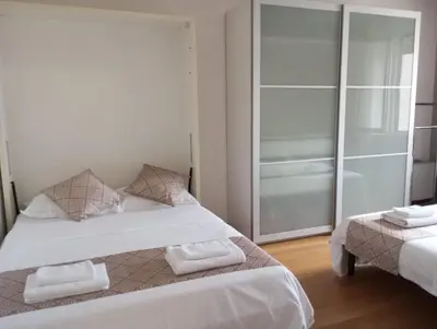 Letto o letti in una camera di Quietnest Venice Station Flat 86sqm 100m to Bus Station 300m to Train Station
