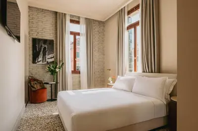 Letto o letti in una camera di Rimon Place Kosher