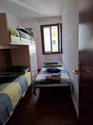 Letto o letti in una camera di Appartamento per 5 pax centro Castelfranco