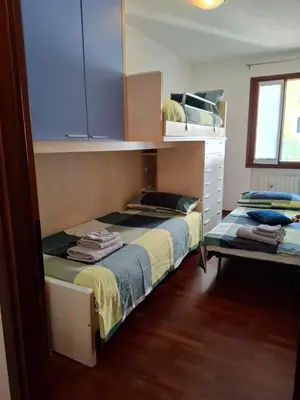 Letto o letti in una camera di Appartamento per 5 pax centro Castelfranco