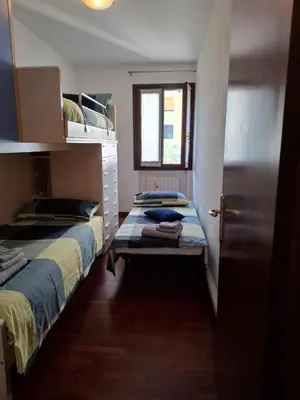 Letto o letti in una camera di Appartamento per 5 pax centro Castelfranco