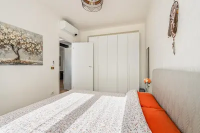 Letto o letti in una camera di GuestHost - Bright Apartment near Mestre Station