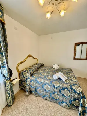 Letto o letti in una camera di Ca' Antico Monastero
