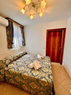 Letto o letti in una camera di Ca' Antico Monastero
