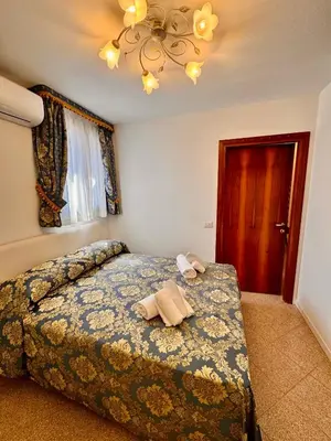 Letto o letti in una camera di Ca' Antico Monastero