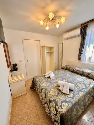 Letto o letti in una camera di Ca' Antico Monastero