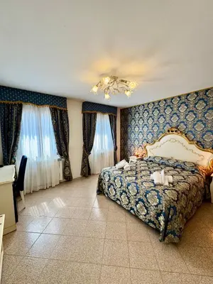 Letto o letti in una camera di Ca' Antico Monastero