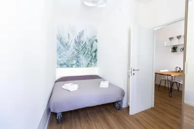 Letto o letti in una camera di Chic & Smart Flat in Padova