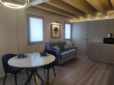 Area soggiorno di CA' del SAL LUXURY APARTMENTS