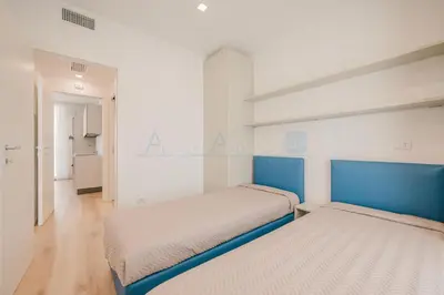 Letto o letti in una camera di Wave Island Carpo F1