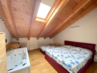 Letto o letti in una camera di JH4 - Carraro Immobiliare - Family Apartments