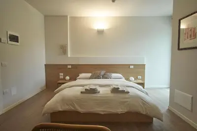 Letto o letti in una camera di Agriturismo CasaMela