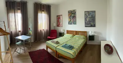 Letto o letti in una camera di Casa Mimma