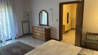 Letto o letti in una camera di Casa Benvenuto