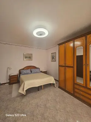Letto o letti in una camera di Casa Benvenuto