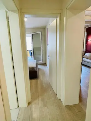 Letto o letti in una camera di Elegant One-Bedroom Apartment with Private Terrace- steps from Basilica del Santo