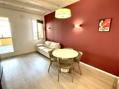 Area soggiorno di Elegant One-Bedroom Apartment with Private Terrace- steps from Basilica del Santo
