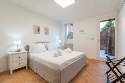 Letto o letti in una camera di Ca' delle Muneghe