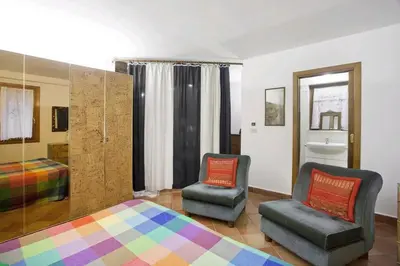 Letto o letti in una camera di Tedeschi - LOCAPPART