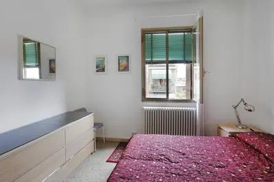 Letto o letti in una camera di Lana - LOCAPPART