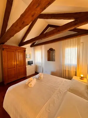 Letto o letti in una camera di Vivere Venezia - cozy accommodations in the heart of Venice