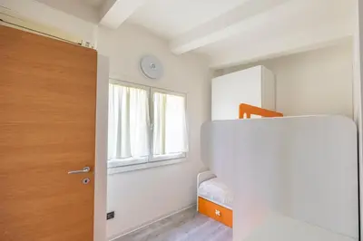 Letto o letti in una camera di Villetta ai Pini by Venicevillas