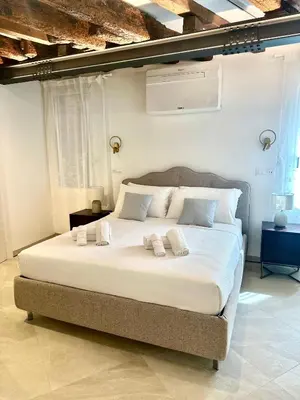 Letto o letti in una camera di Casa Dolce Riva