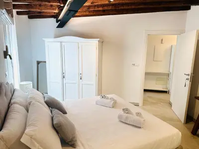Letto o letti in una camera di Casa Dolce Riva