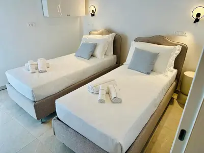 Letto o letti in una camera di Casa Dolce Riva