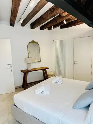 Letto o letti in una camera di Casa Dolce Riva