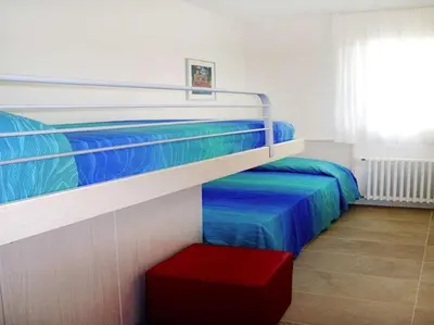 Letto o letti in una camera di Villa Faro Vecchio