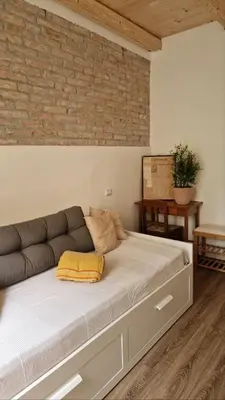 Letto o letti in una camera di zona Ospedali - piano terra tranquillo - clima - Nina