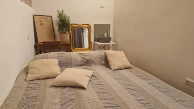Letto o letti in una camera di zona Ospedali - piano terra tranquillo - clima - Nina