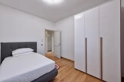 Letto o letti in una camera di Paleocapa Apartments