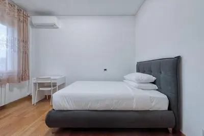 Letto o letti in una camera di Paleocapa Apartments