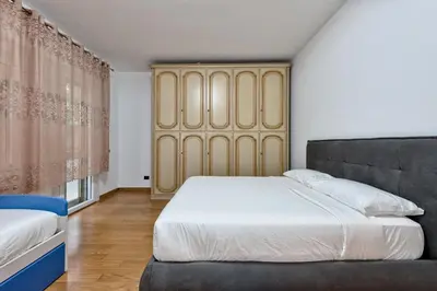 Letto o letti in una camera di Paleocapa Apartments