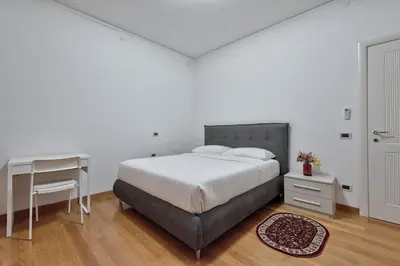 Letto o letti in una camera di Paleocapa Apartments