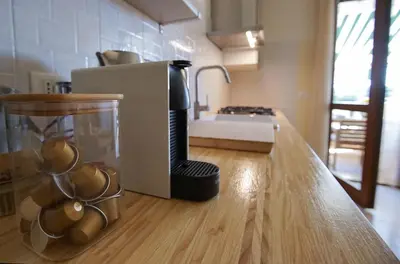 Letto o letti in una camera di Casa Origine, appartamento vista piscina, al mare