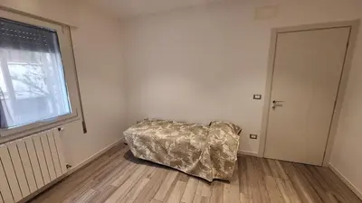 Letto o letti in una camera di Mestre via Salsa - Comodo appartamento easy to Venice