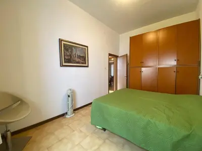 Letto o letti in una camera di Jesolo Via Gozzi
