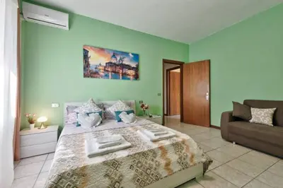 Letto o letti in una camera di Venice Miramare Residence 2