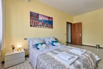 Letto o letti in una camera di Venice Miramare Residence 2
