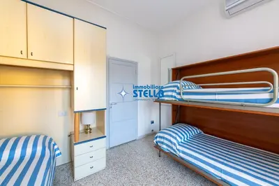 Letto o letti in una camera di Condominio Marchioretto
