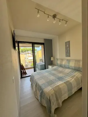 Letto o letti in una camera di APPARTAMENTO MARCONI B1 s