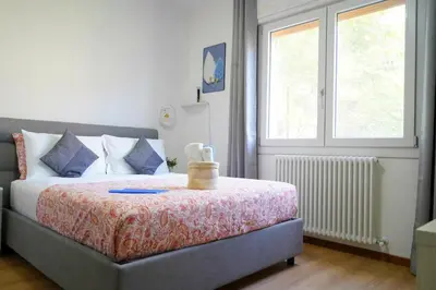 Letto o letti in una camera di Magnolia Boutique Luxury Rooms